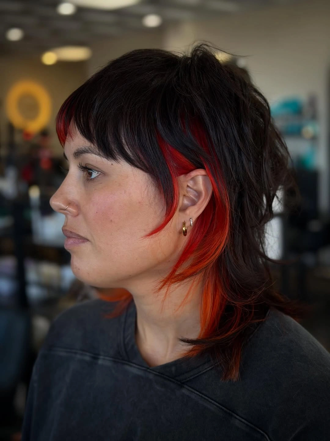 dark brown short shaggy mullet with fringe with bright side and nape panels