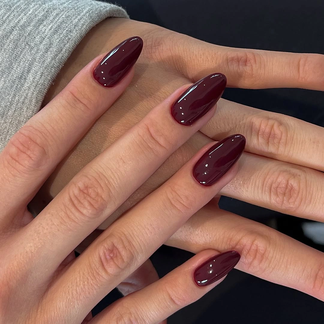 deep burgundy long almond nails with single color