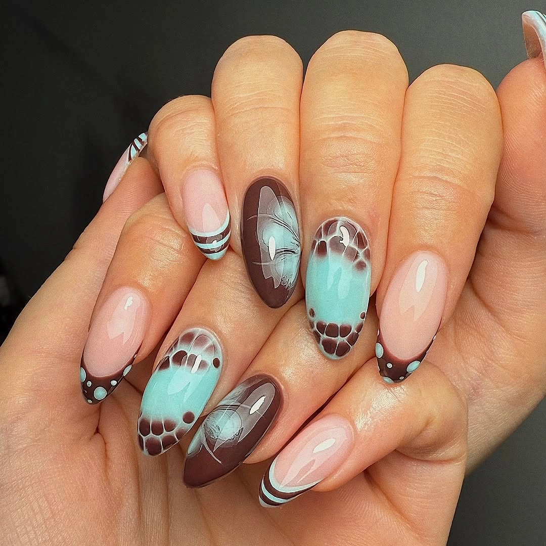 pale pink medium almond nails with striped tips and scallop accent