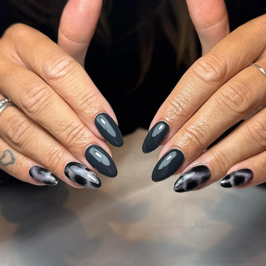 navy black medium almond nails with smoky abstract accent