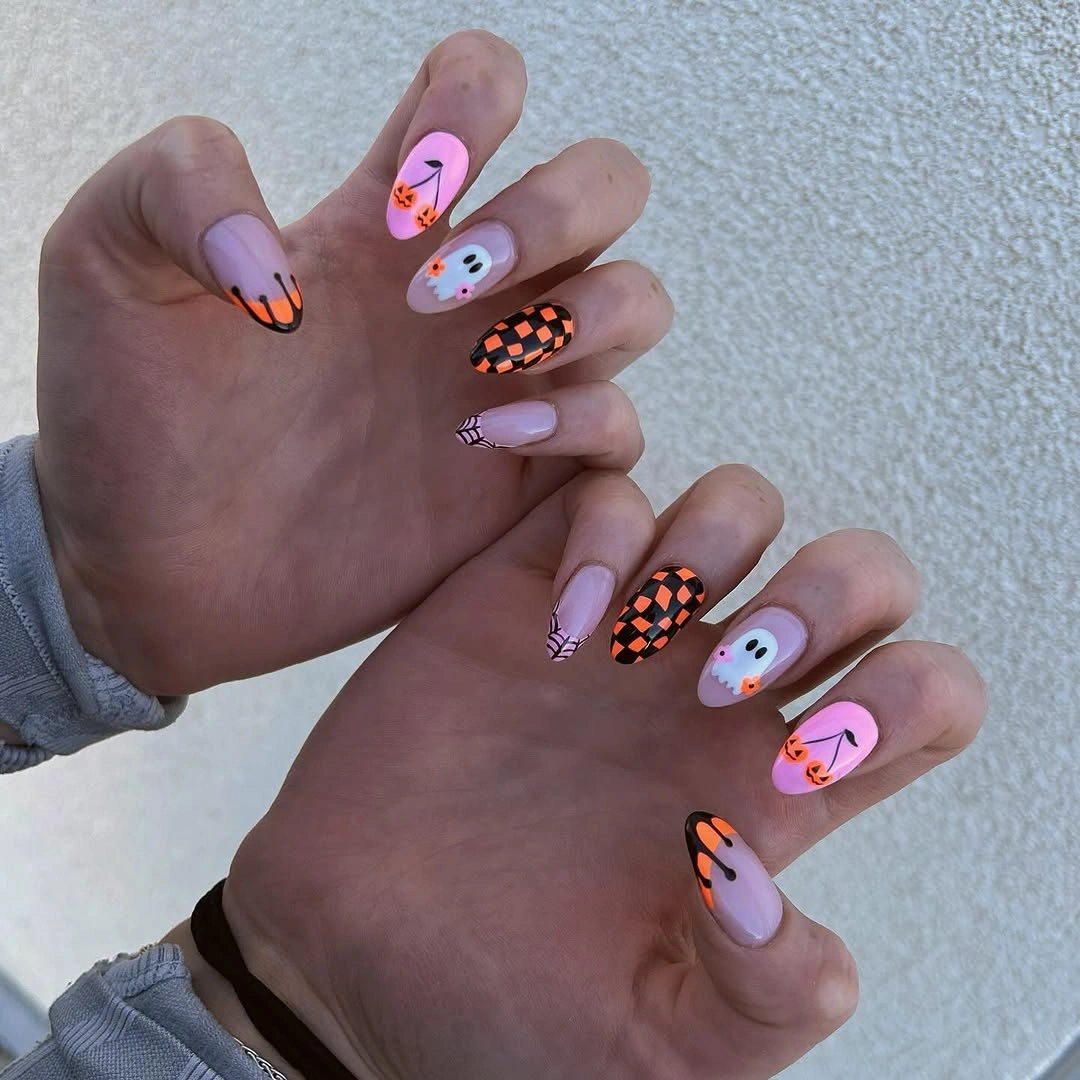 pale lavender long almond nails with pumpkin, ghost, checker