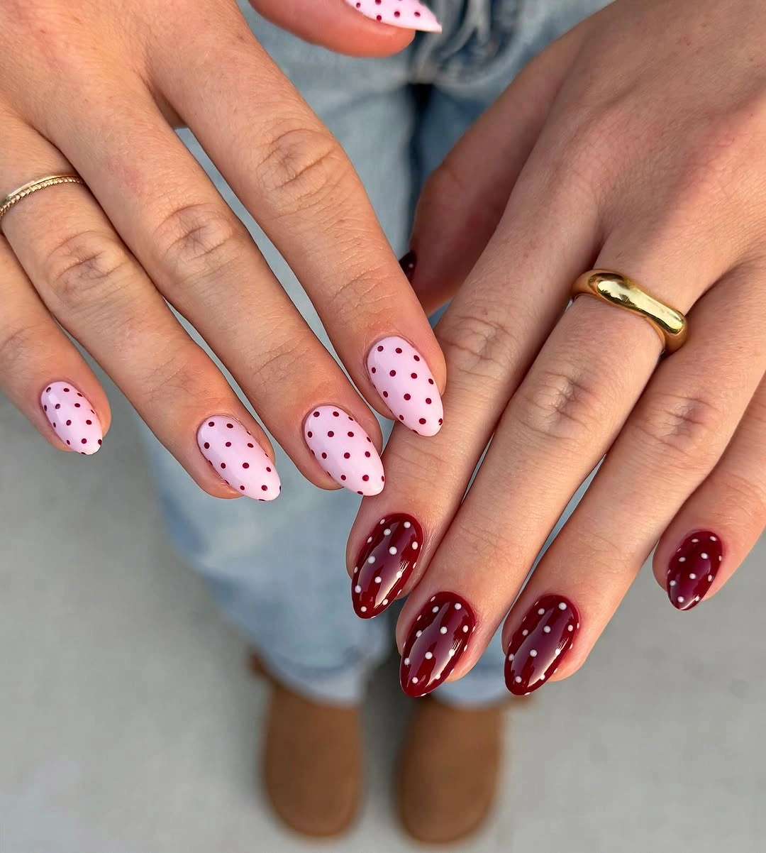 Pale pink and burgundy oval nails with reversed dots