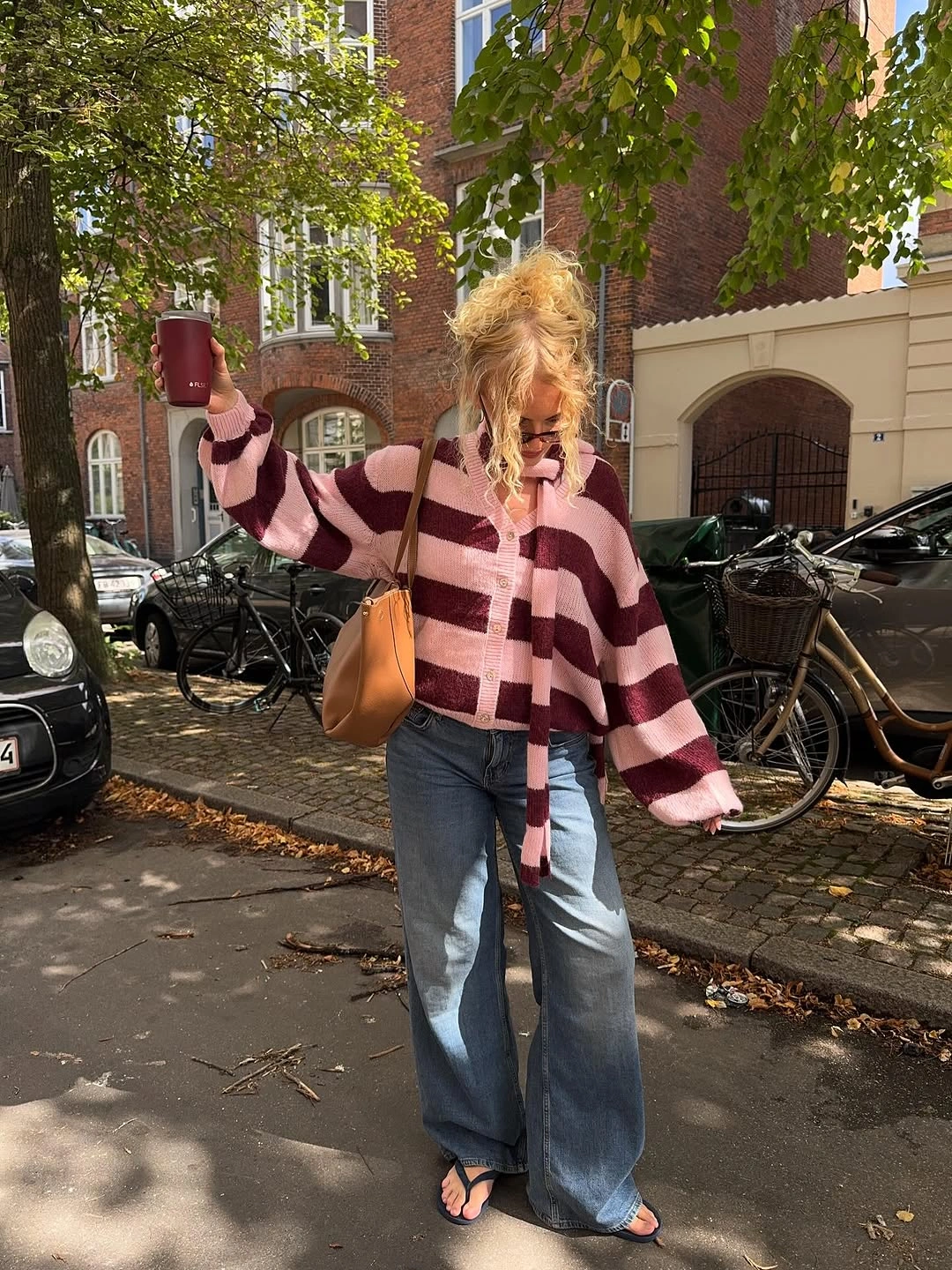 Oversized pink burgundy stripes with wide blue jeans