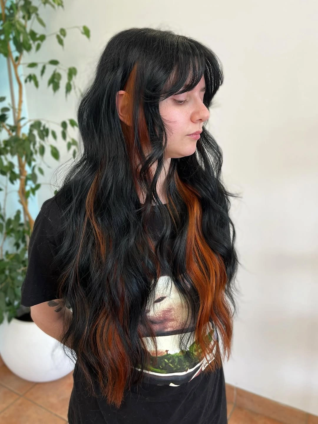 Dark long hair with bright copper lower sections