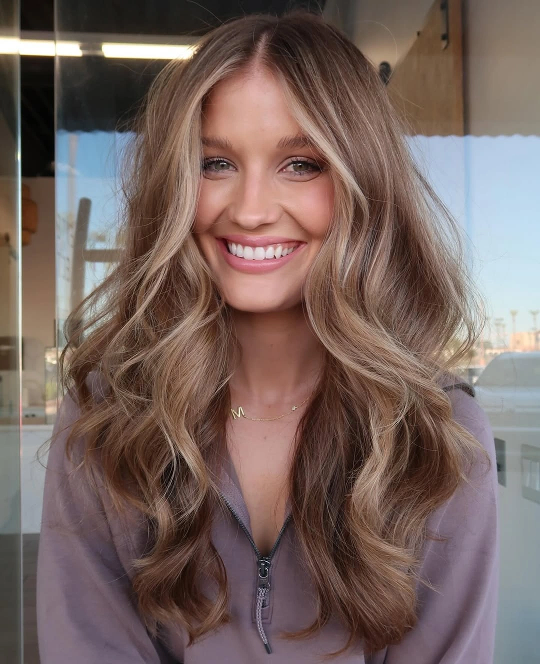 Long bronde waves with lighter face-framing pieces