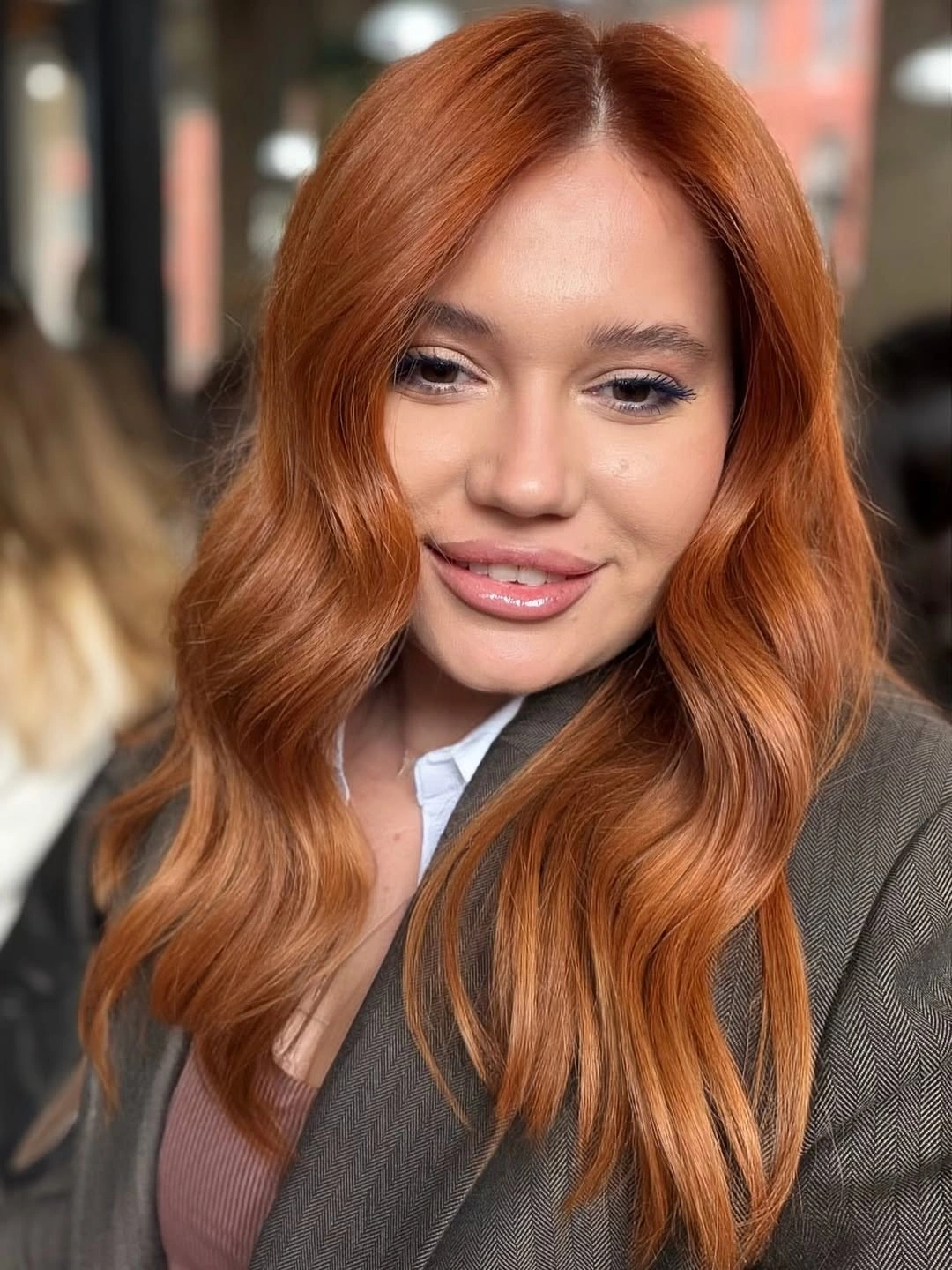 Long copper auburn hair in smooth waves