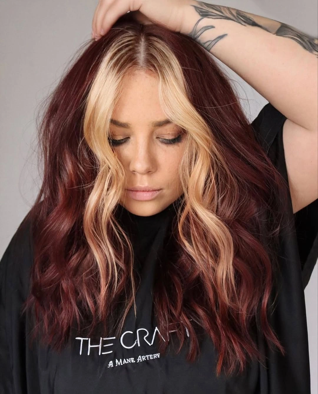 Deep burgundy waves with pale face-framing pieces