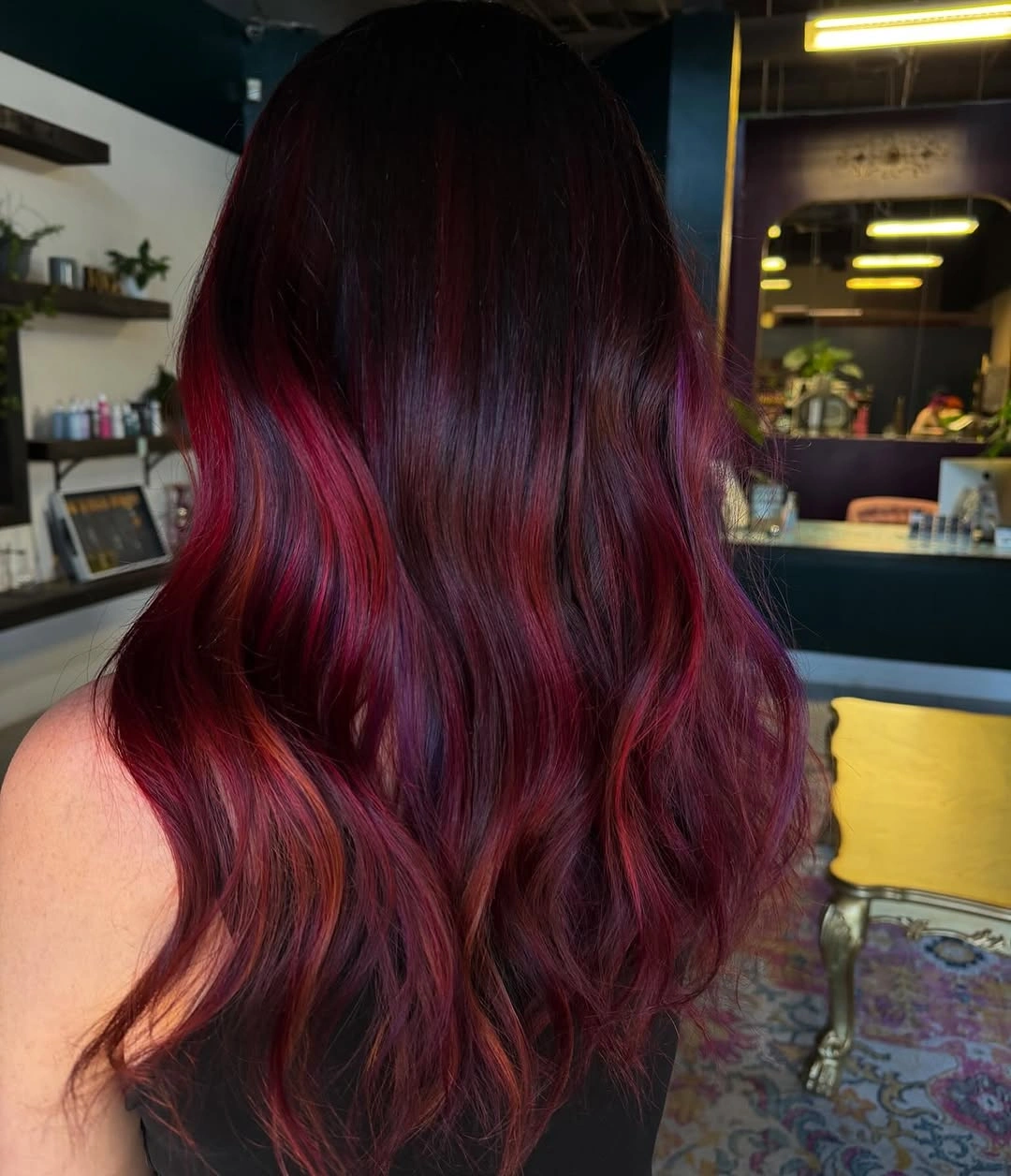 Long dark waves with burgundy and magenta ribbons