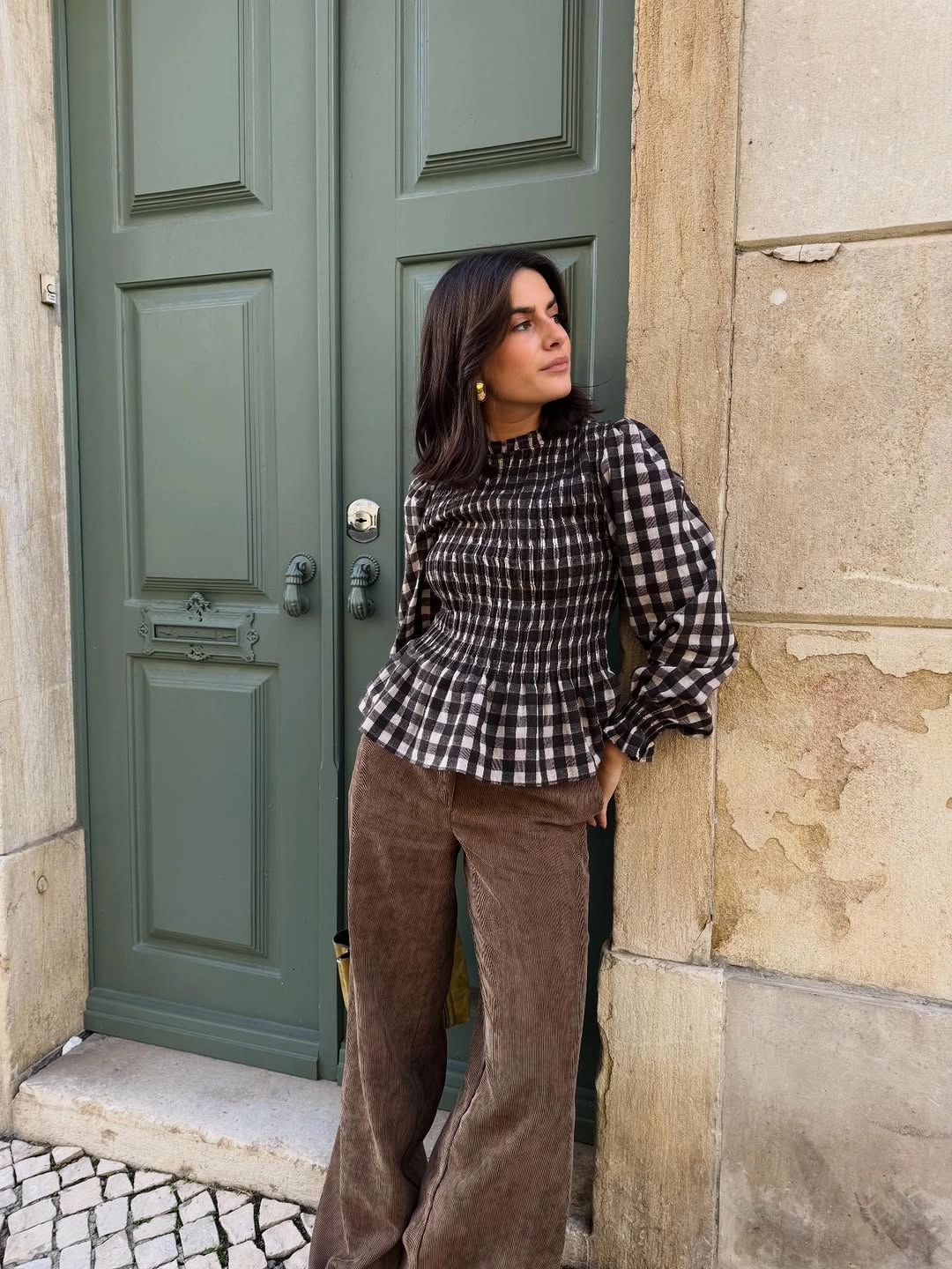 Checked peplum blouse with wide brown trousers
