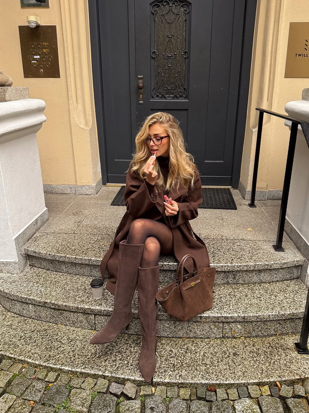 Brown coat with short outfit tall boots and tote