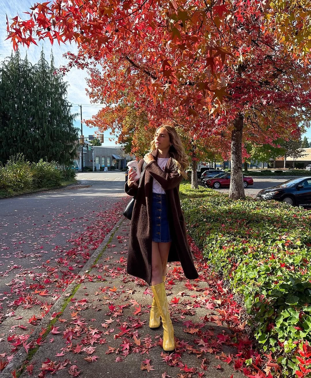 Dark brown coat with mustard boots and a short base