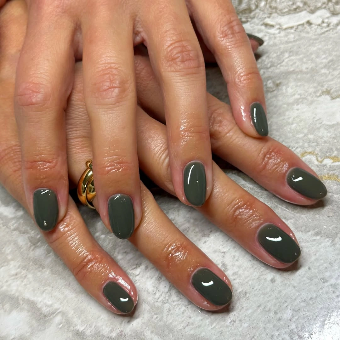 short rounded muted gray-green nails