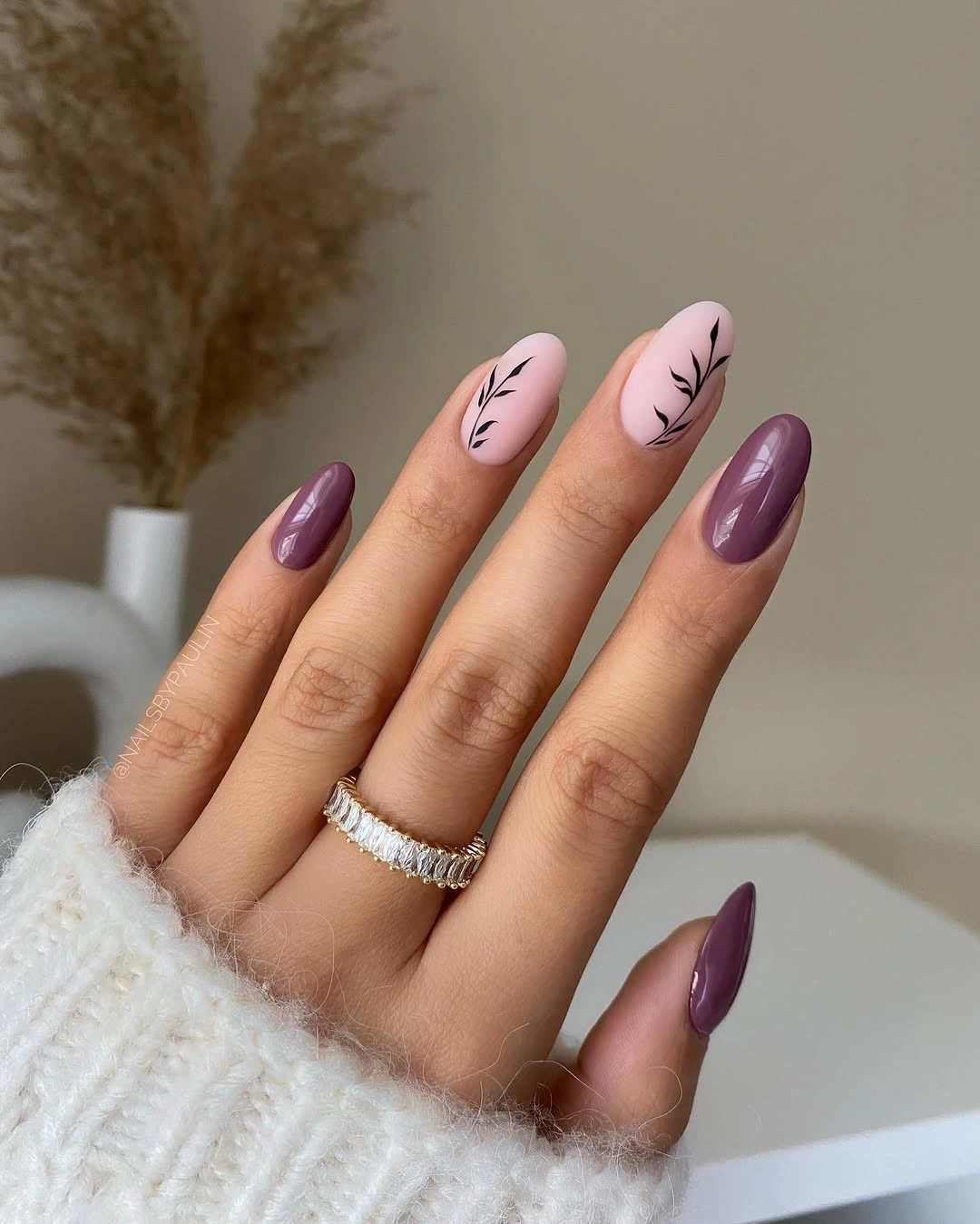 medium almond plum nails with pale botanical lines