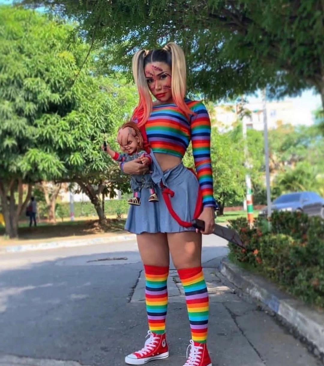 rainbow colors outfit with fitted striped top, short A-line skirt, knee socks, and sneakers