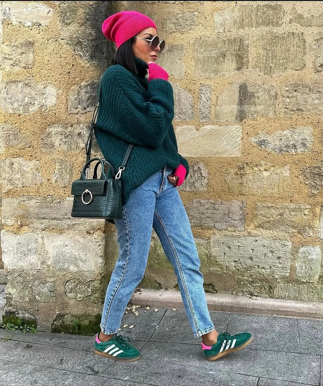 Teal oversized sweater, pink beanie, jeans and green sneakers