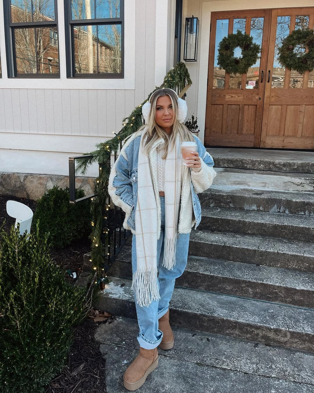 Light blue denim layers with cream scarf and tan boots