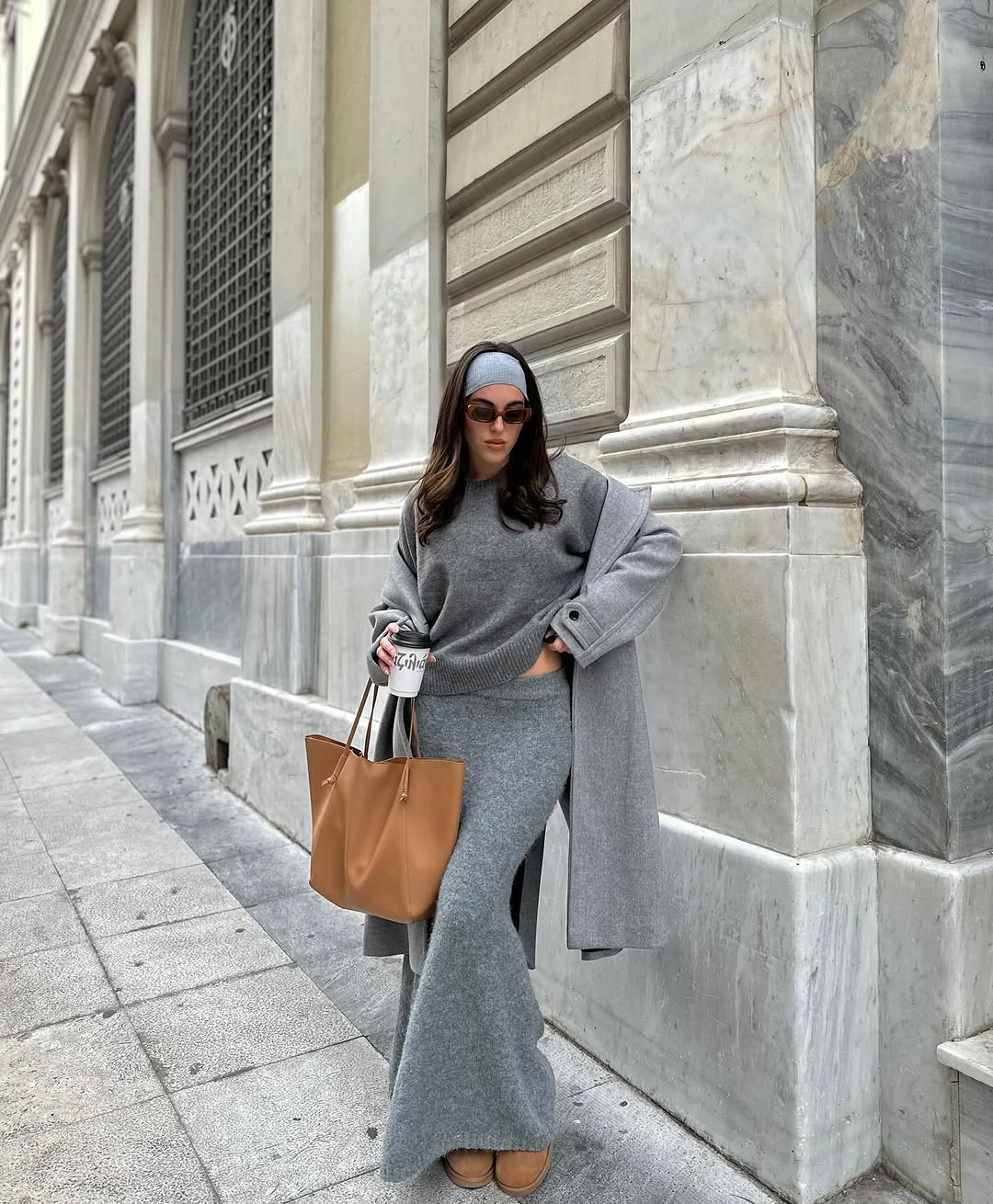 Gray coat, long gray skirt, tan tote, low tan shoes