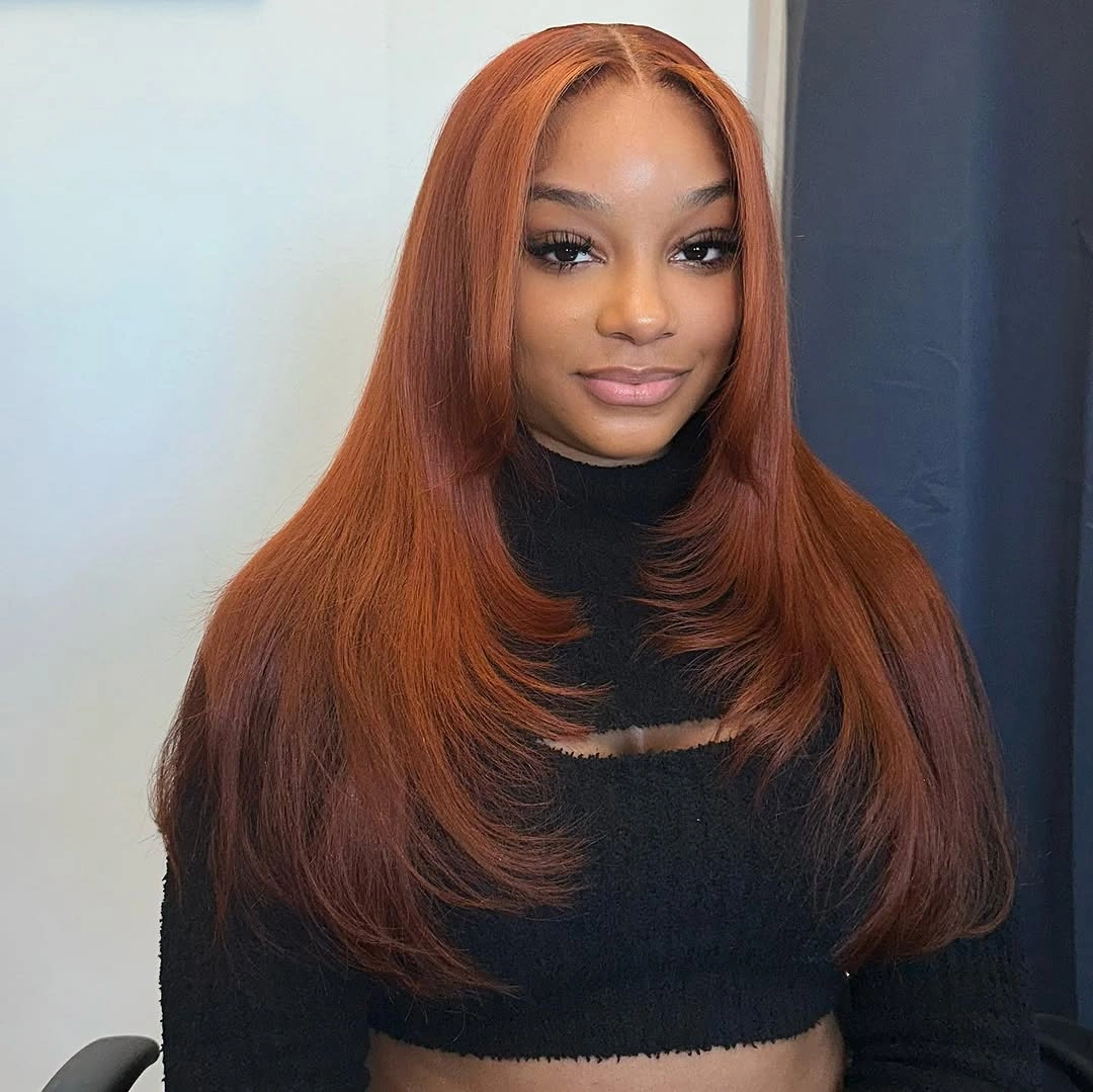 Long smooth copper hair with center part