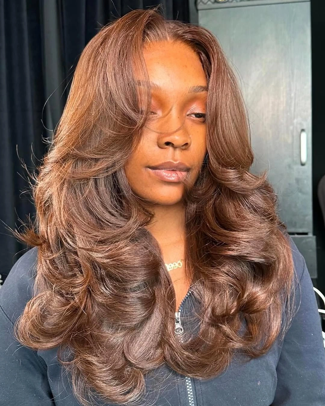 Long mocha brown hair with voluminous curled layers