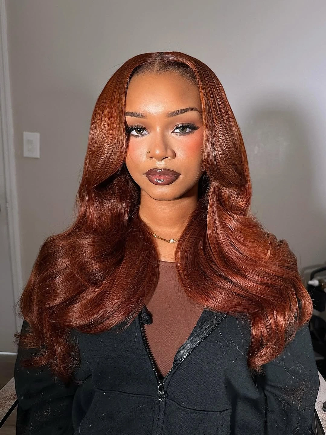 Long mahogany copper waves with glossy curved ends