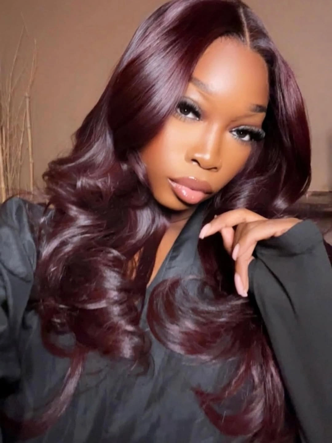 Long deep burgundy wine hair with glossy waves