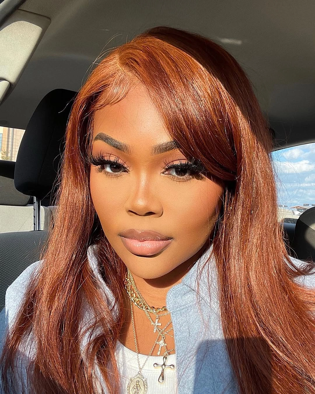 Long copper auburn hair with glossy side-swept front