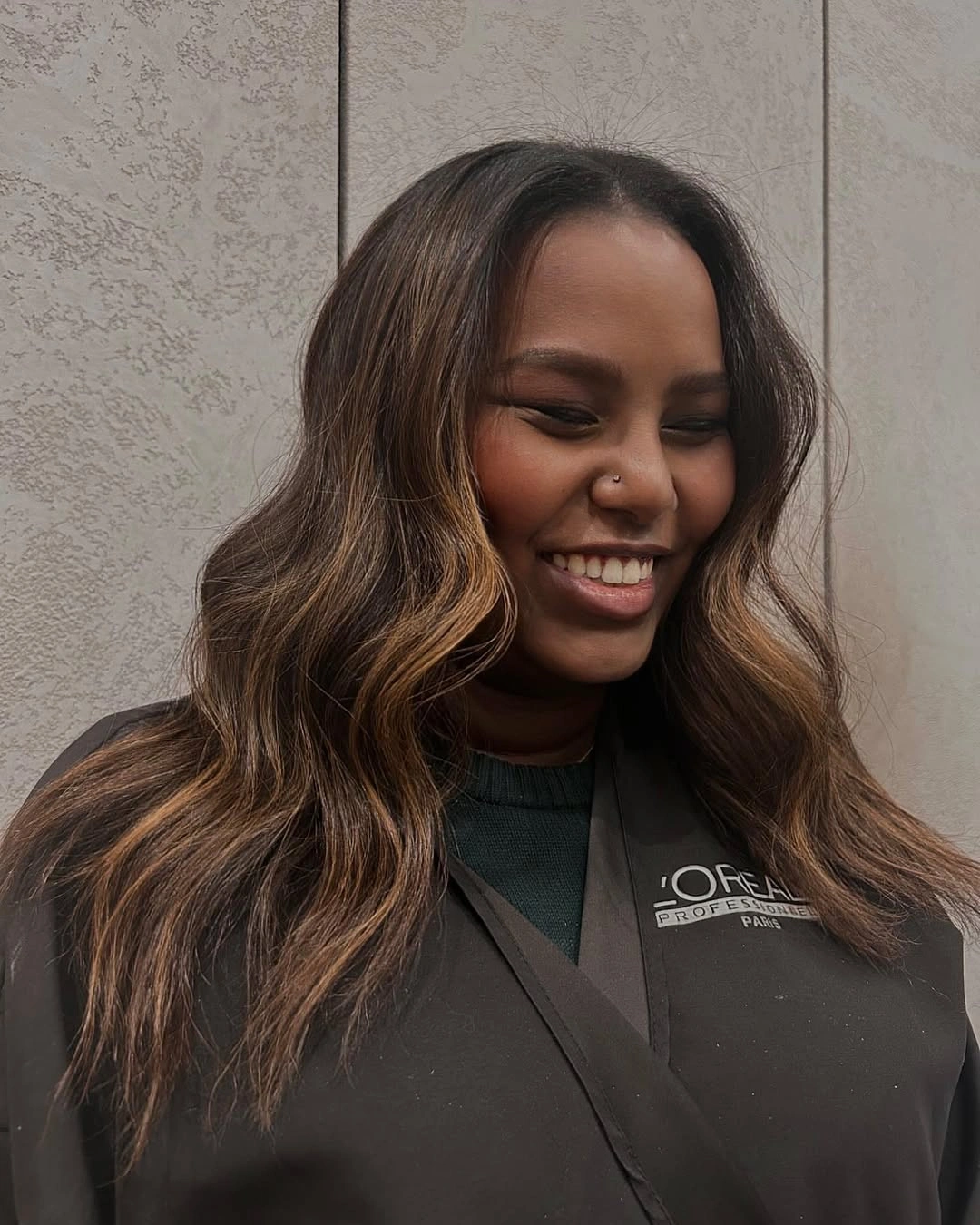 Dark brunette waves with caramel front and side pieces