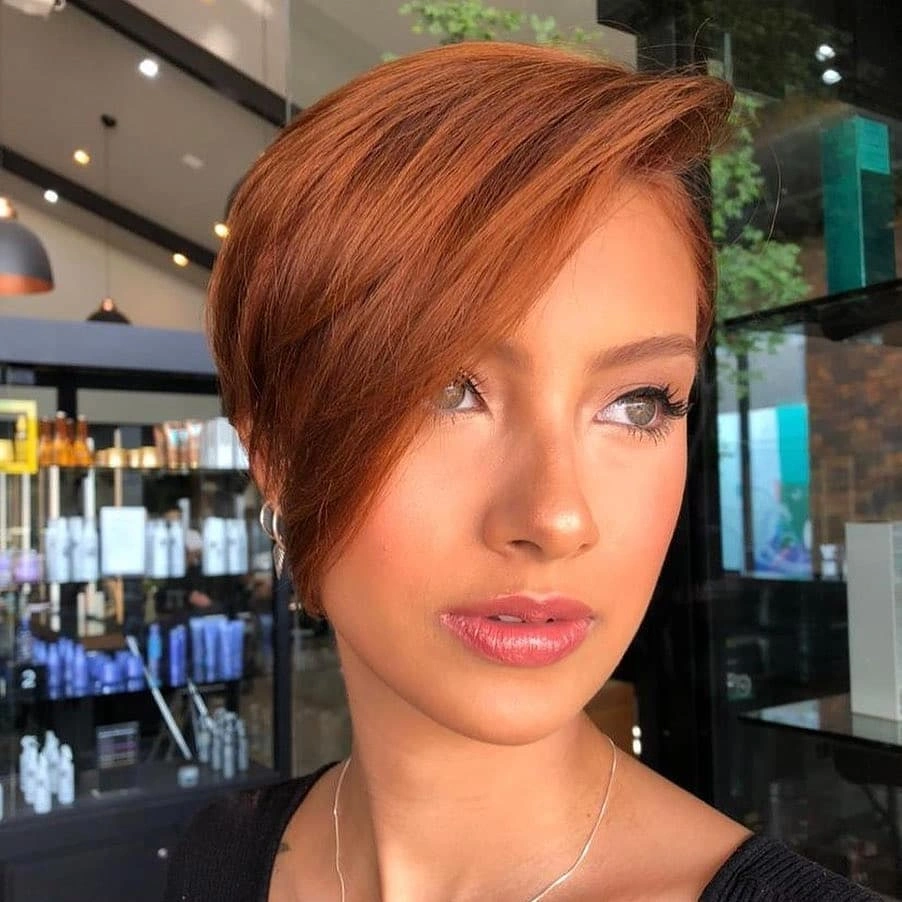 Copper long pixie with extended side-swept fringe