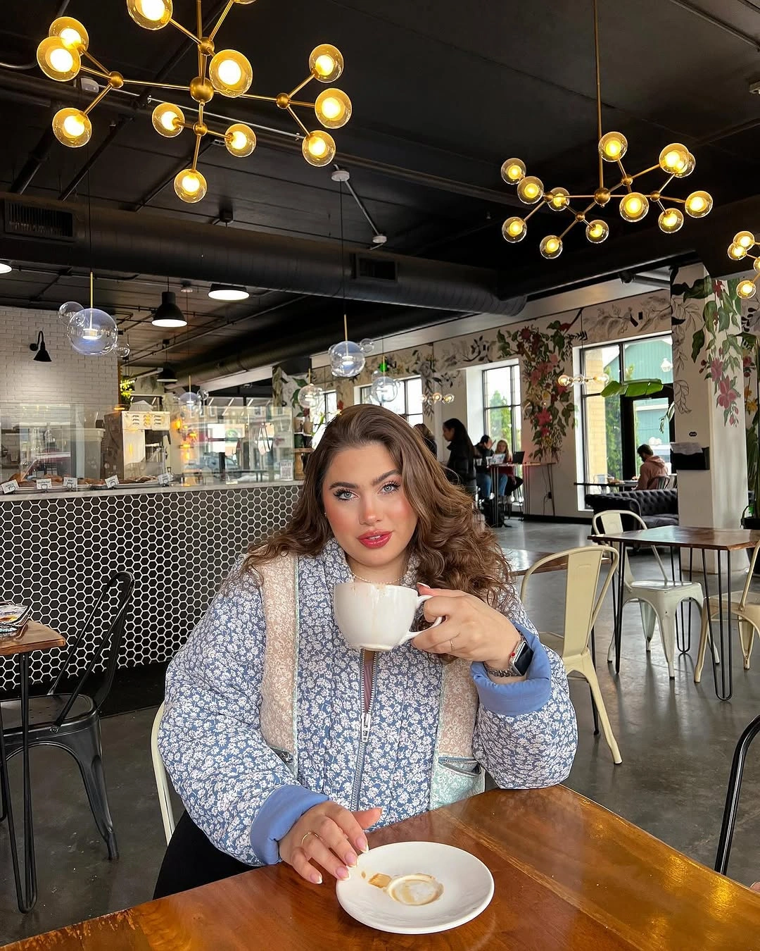 Light blue floral quilted jacket with coffee cup