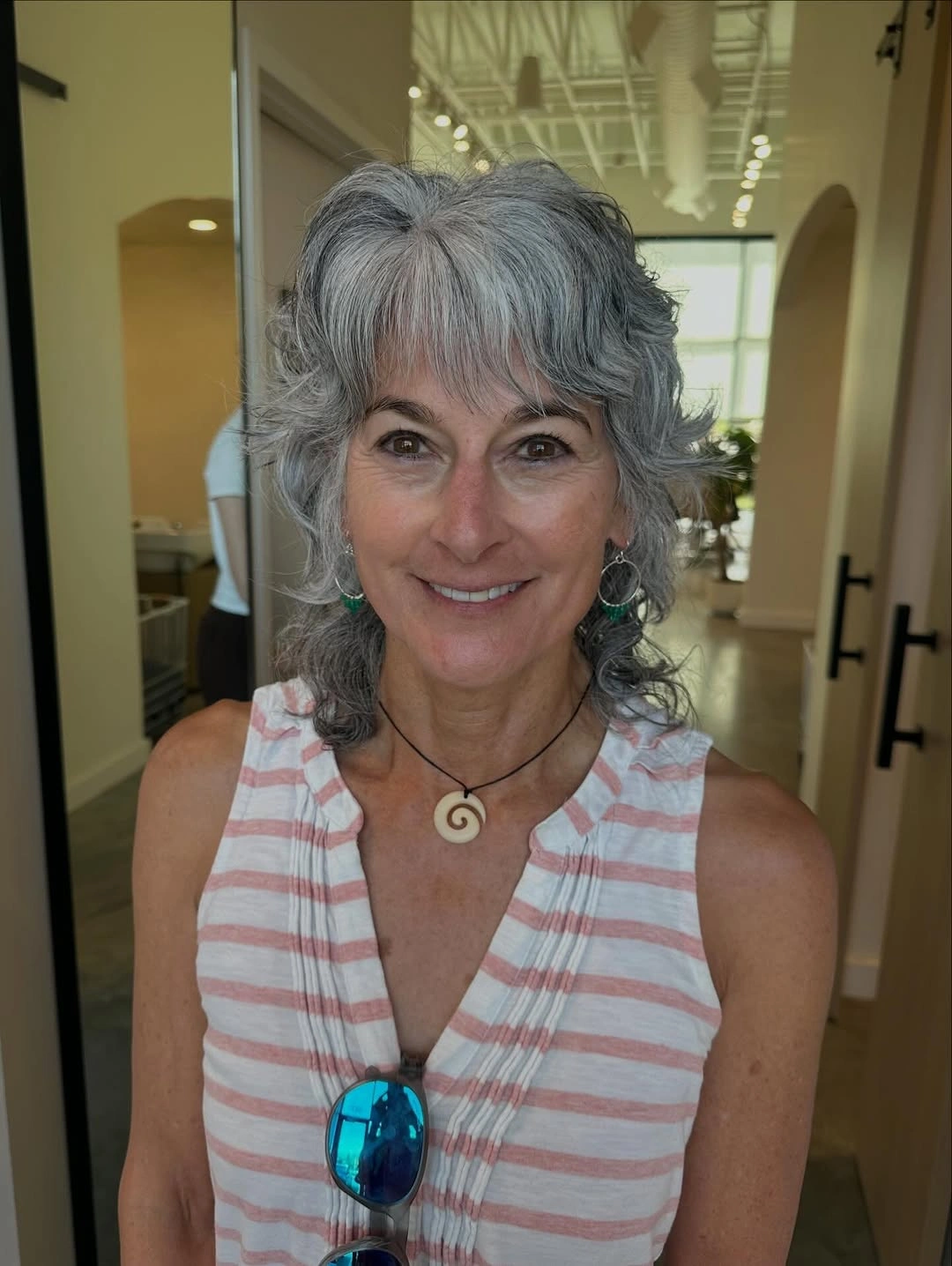 Silver-gray shag with full fringe and layered shoulder-length back