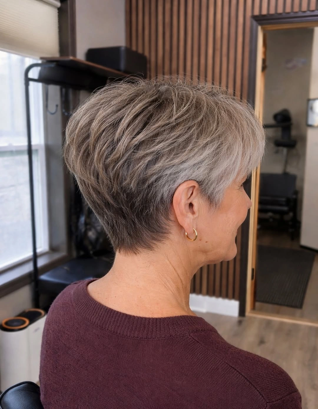 Back view of short gray pixie with tapered nape