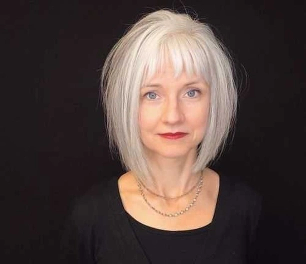 Straight silver medium bob with short fringe and longer sides