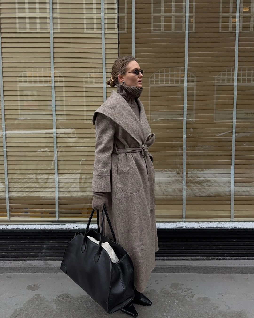 Taupe wrap coat with shawl collar and black tote