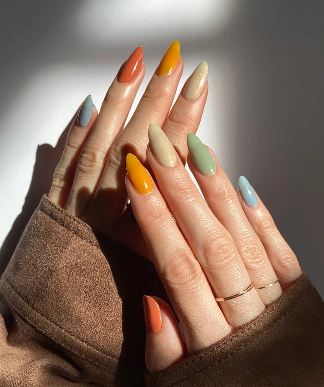 Long almond nails in rust mustard cream sage and blue