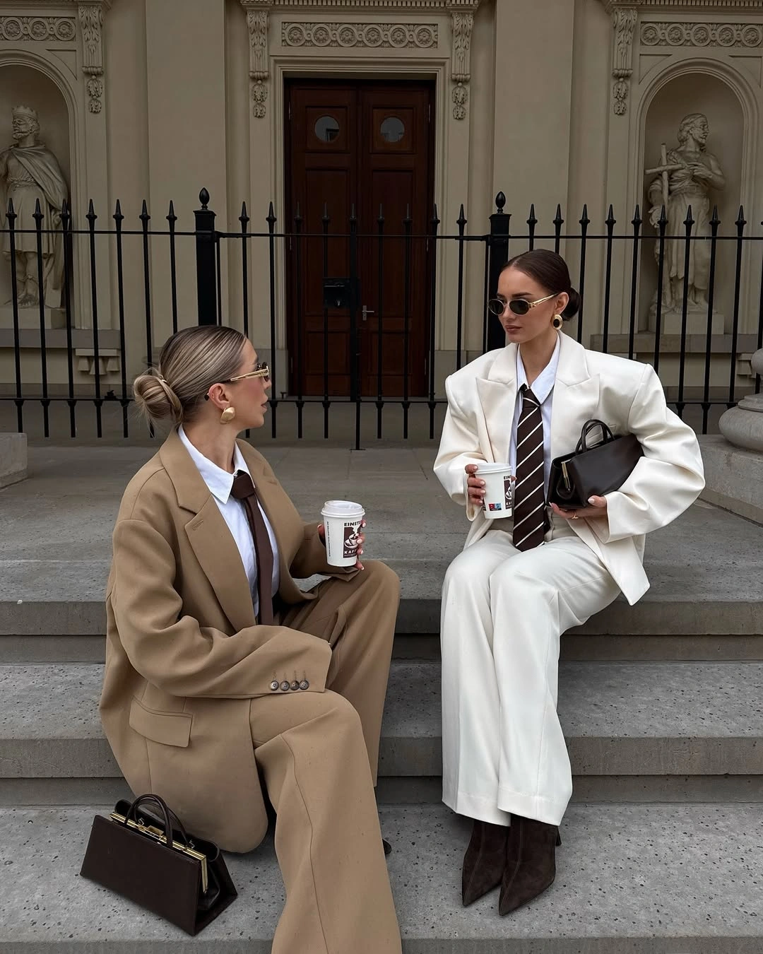 Camel suit and ivory suit with shirts bags and takeaway cups