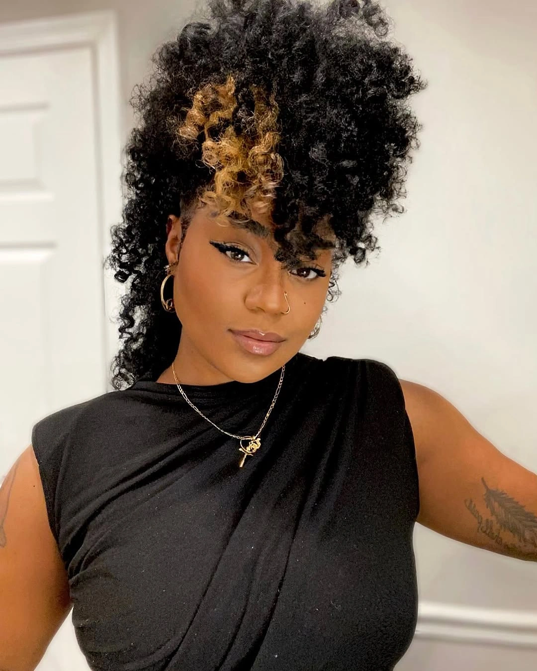 High black curls with golden front cluster and longer back curls