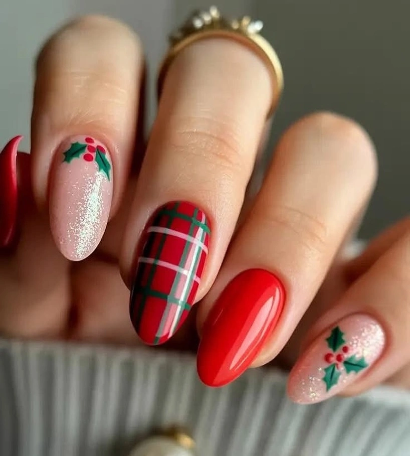 Almond nails with red plaid and holly accents