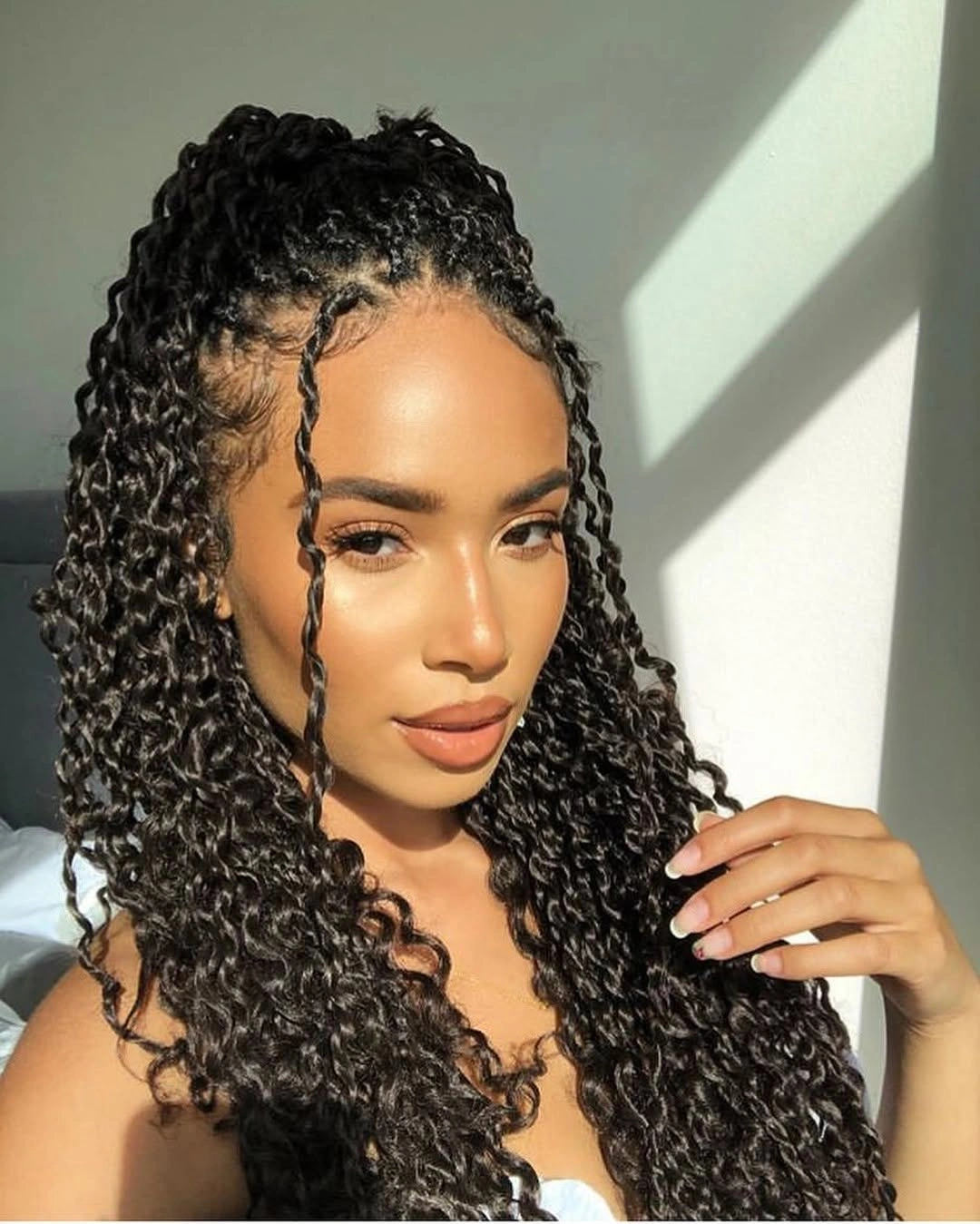 Long dark spiral lengths with raised crown and front tendril