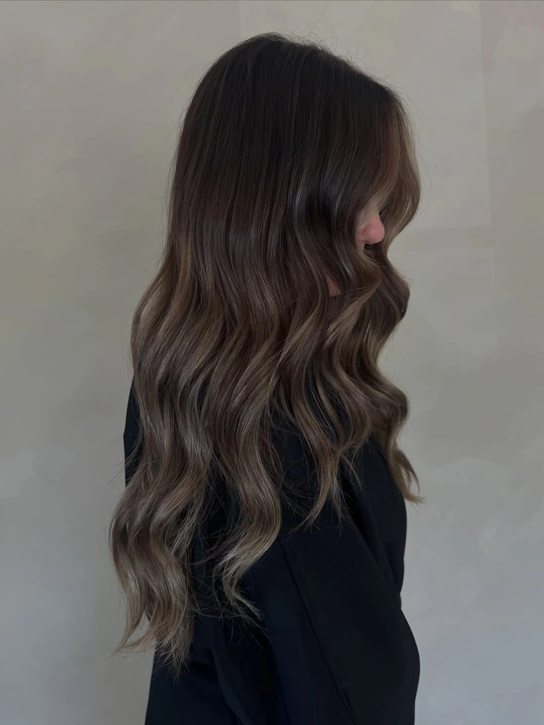 Long dark brunette waves with muted cool taupe ribbons