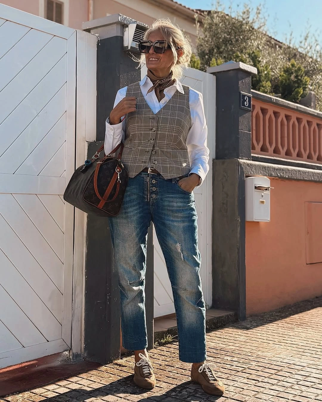 White shirt with plaid waistcoat and cropped jeans
