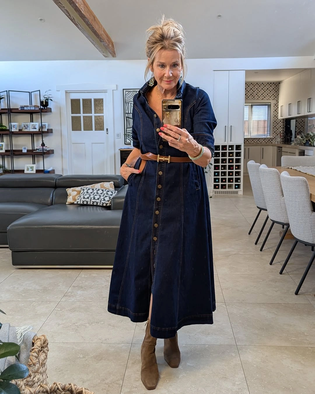 Dark denim button-front dress with tan belt and boots