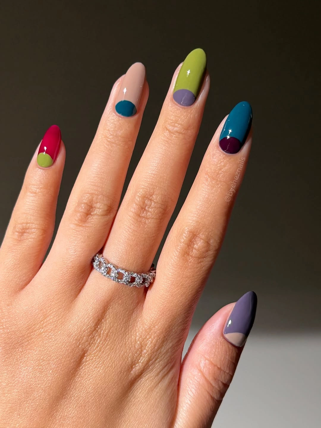 Long almond nails with colorful blocks and dots