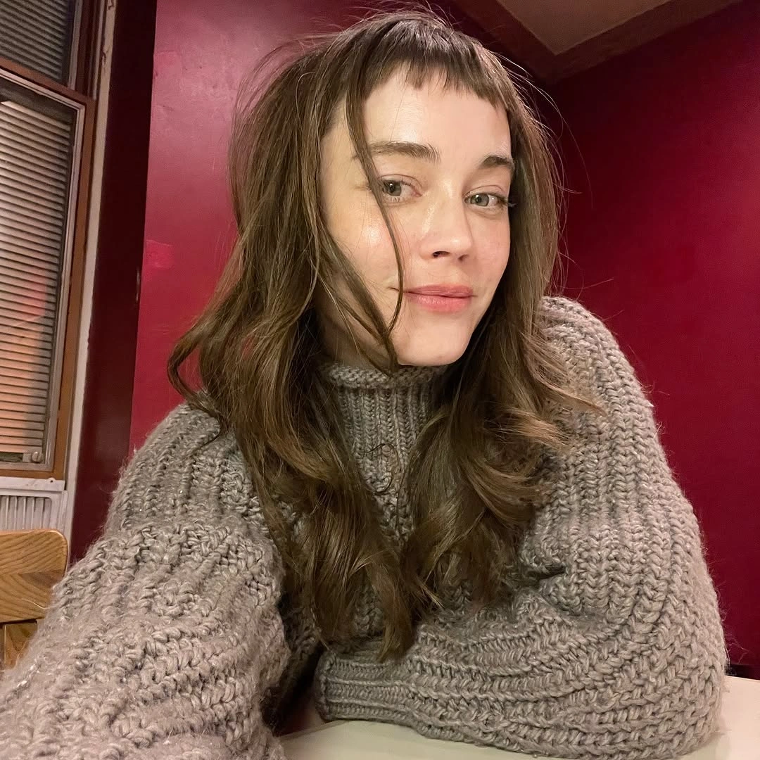 Long brown waves with very short bangs