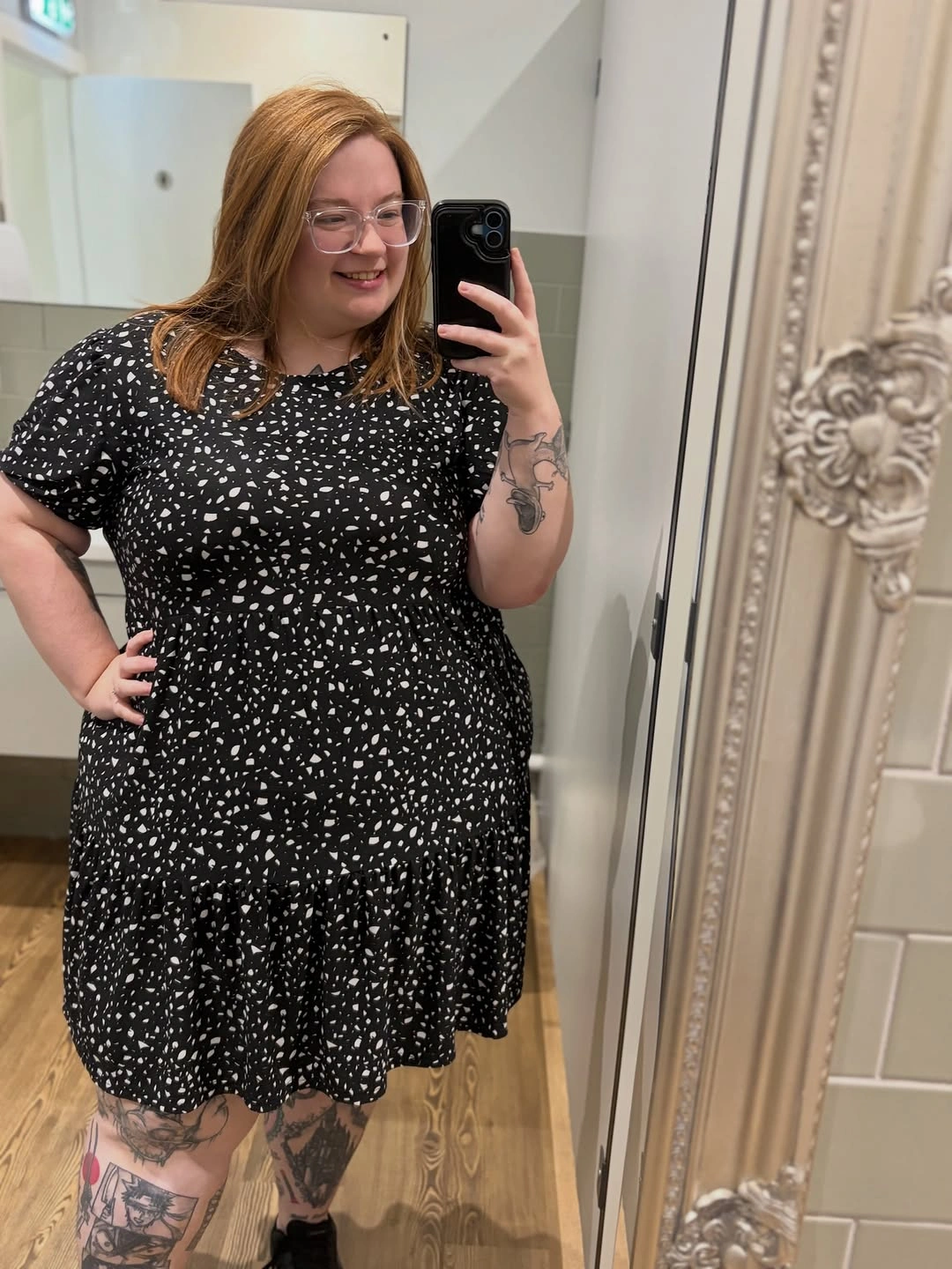 Copper straight hair with glasses and printed dress