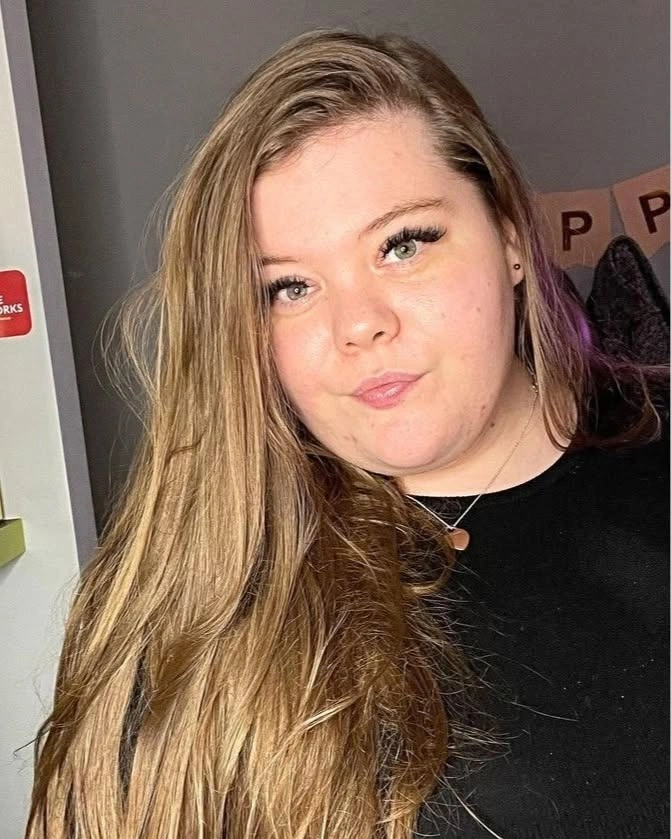 Very long blonde hair with darker brown sections