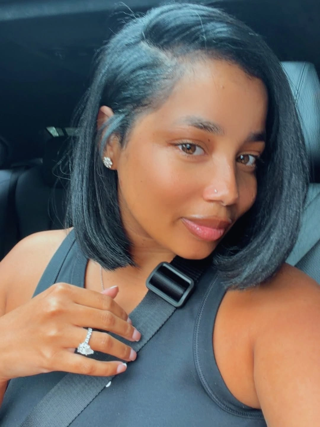 Side-parted sleek bob with one side tucked back