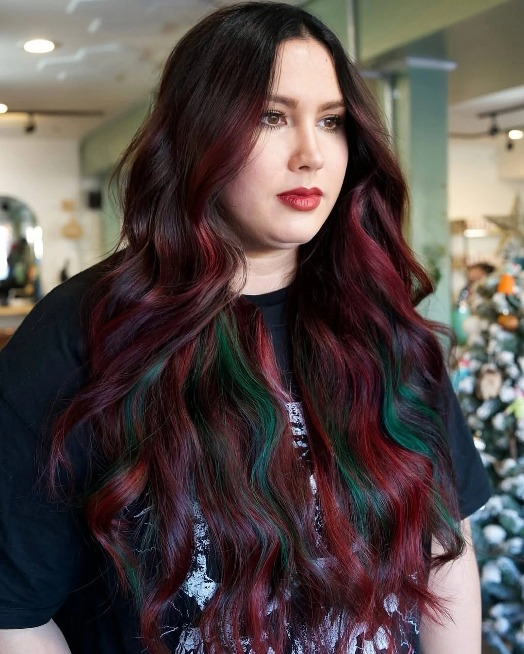 Long dark waves with burgundy and teal-green color panels