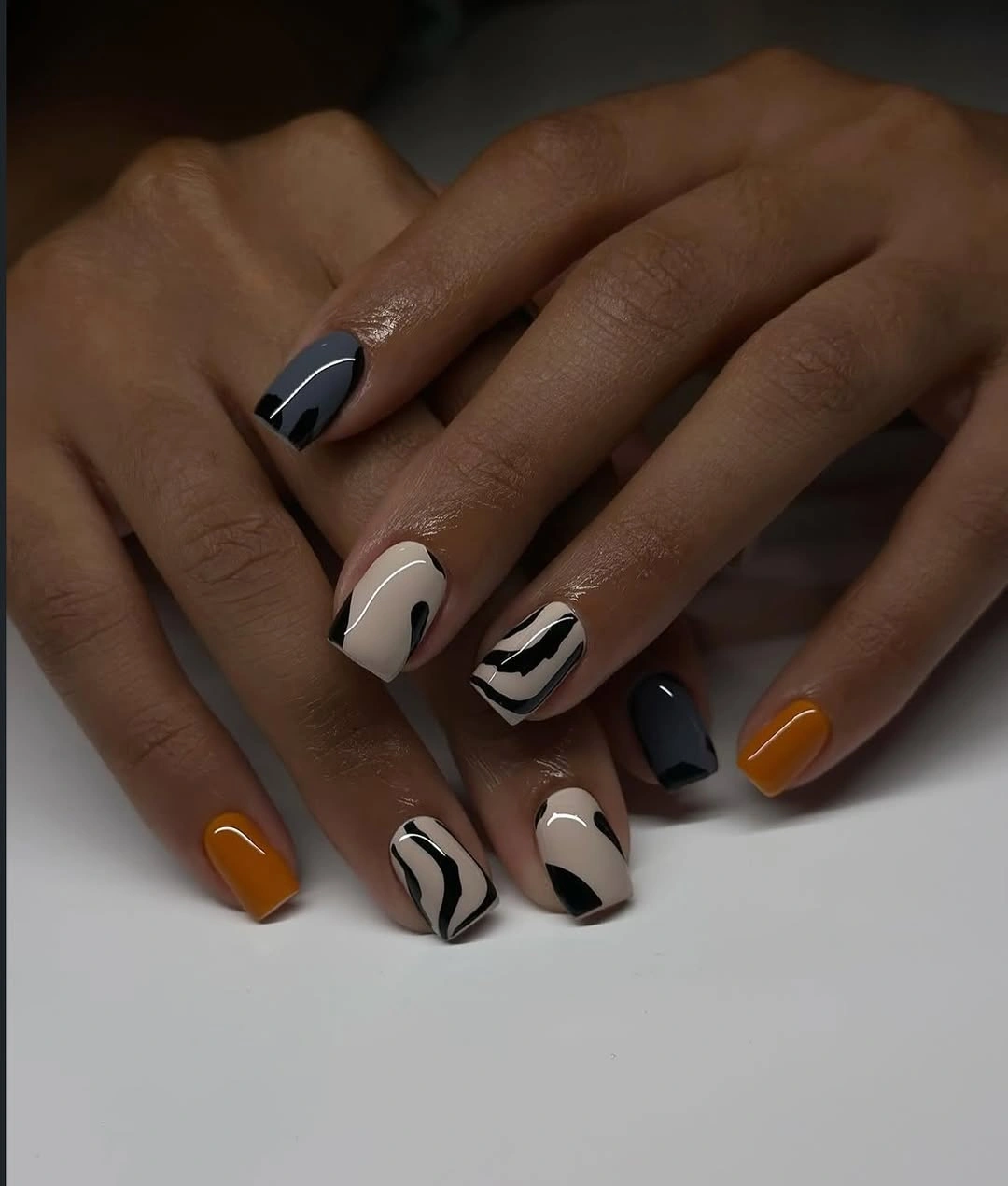 Abstract black cream and mustard short square nails