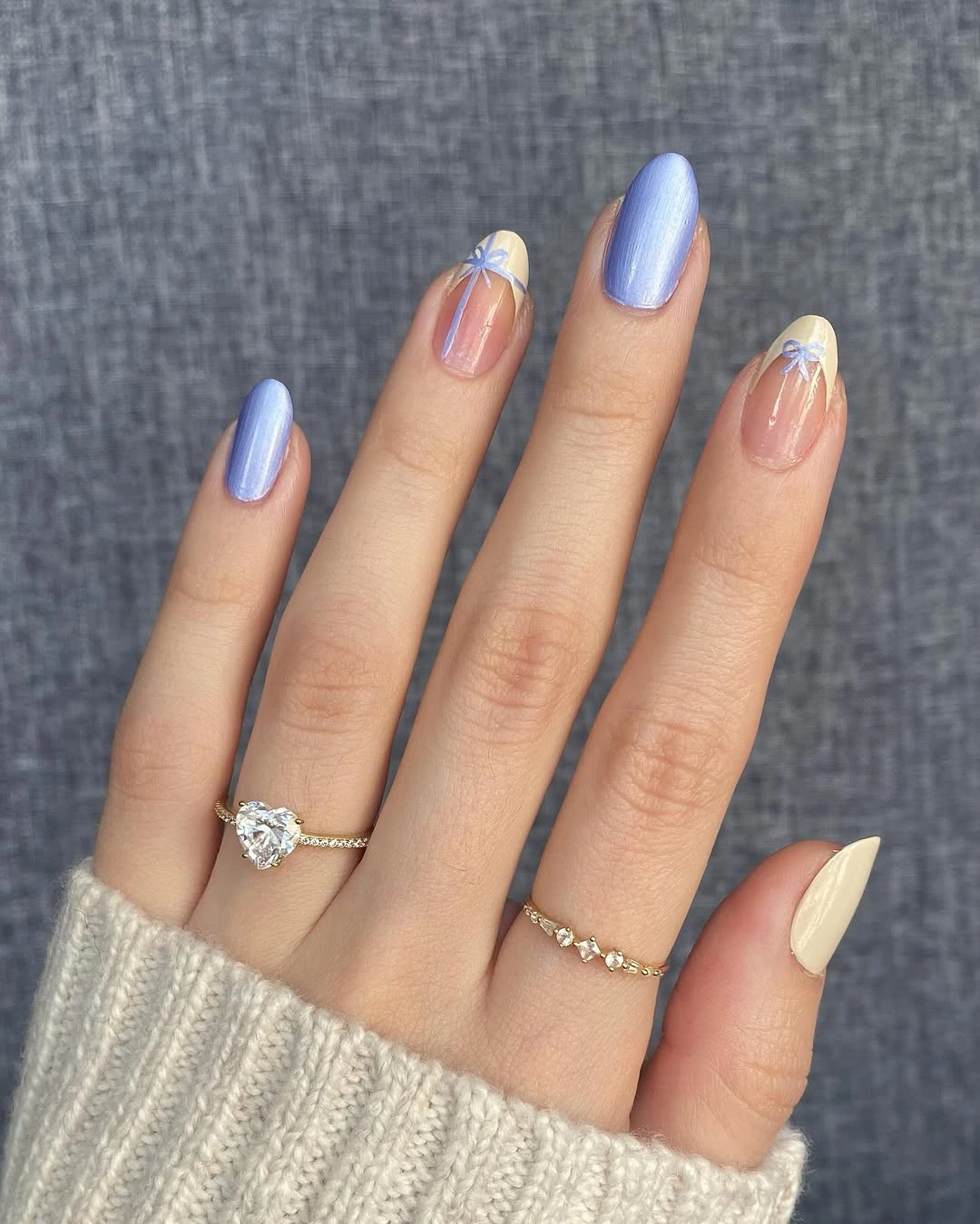 Pearly periwinkle nails with sheer nude floral accents