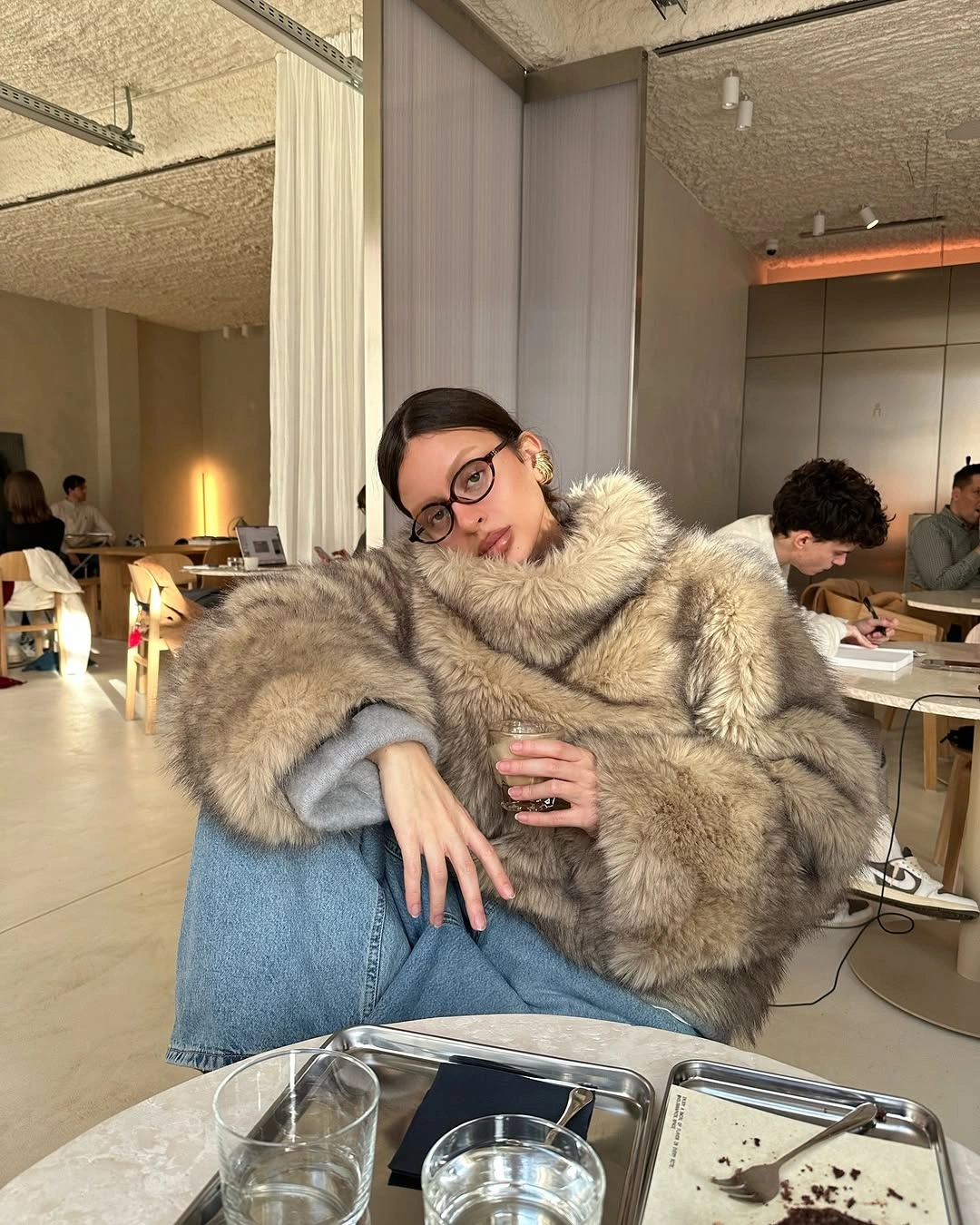 Shaggy taupe coat with pale blue lower layer